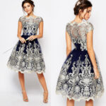 Elegant Lace Patchwork Dress with a round neck and loose fit
